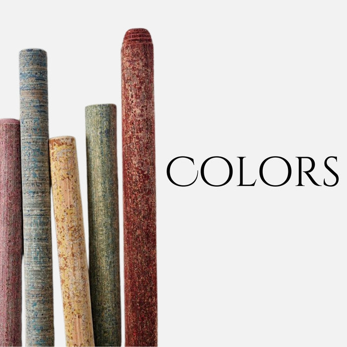 A collection of rolled-up vintage rugs in various colors and textures, including blue, beige, green, and red, arranged vertically with the word "COLORS" displayed in bold typography.